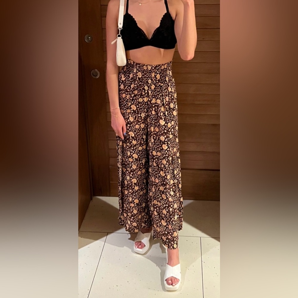 Billabong flowy black pants with flower design - size small